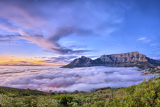 Clouds covering Cape Town with Table Mountain rising above