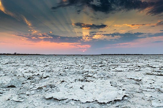 Sunset over the barren salt flats of Nxai Pan, Botswana